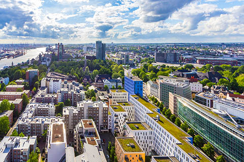 A stock aerial photo of a green city.